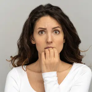 A lady looking worried working for avon & about selling avon